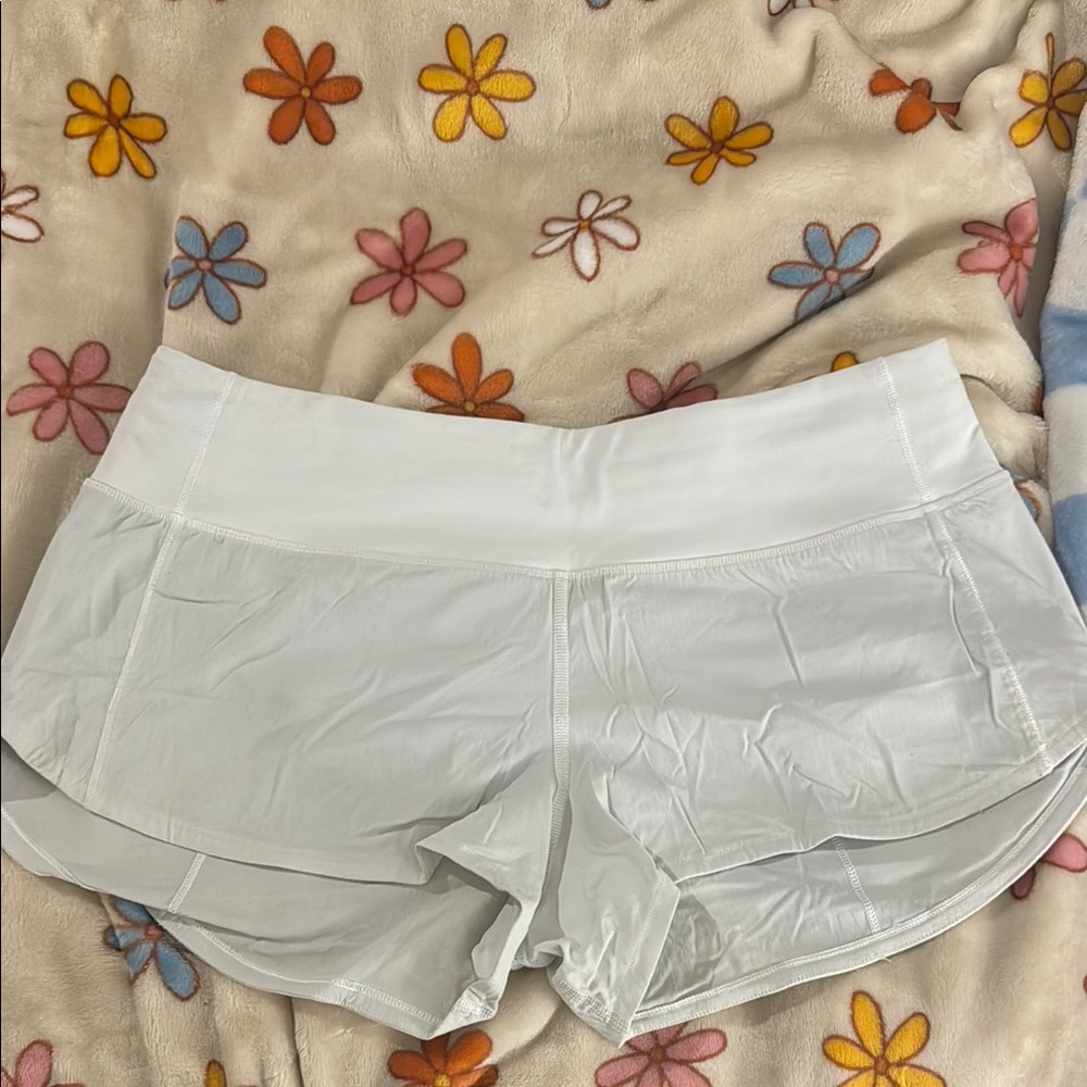 White Lululemon 2.5” speed ups